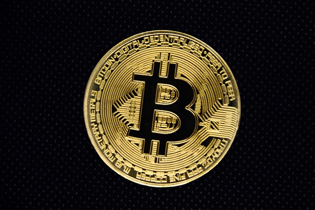 Hollow Bitcoin logo on a coin.
