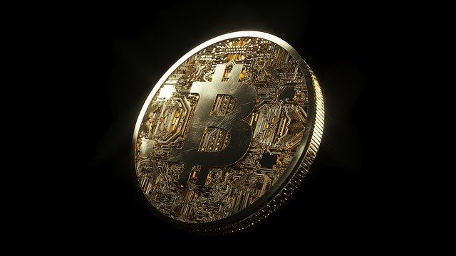 Bitcoin logo on a coin.